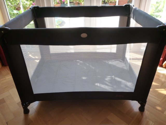 red travel cot